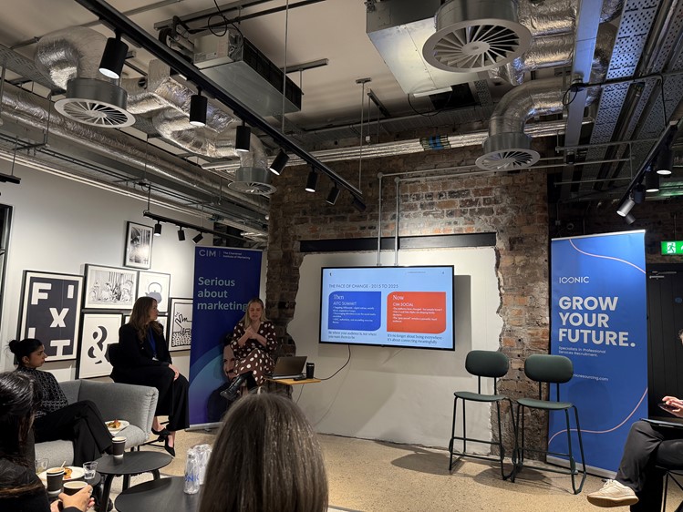 People engaged with a CIM Scotland breakfast social event